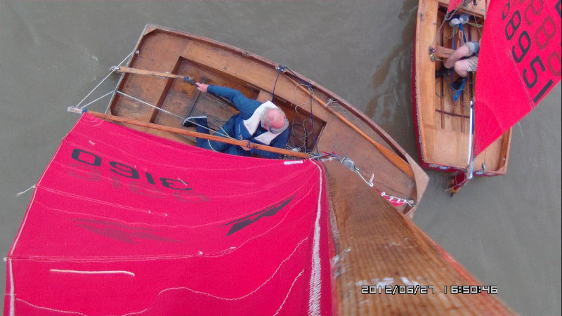 Wooden Mirror dinghy racing as seen from the top of the mast