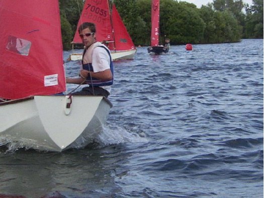 Mirror dinghy number 14 sailing at Wraysbury Lake SC Mirror Open in 2003