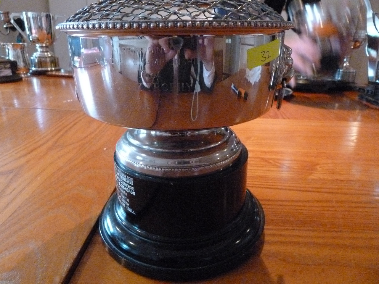 A silver rosebowl with a black plastic base